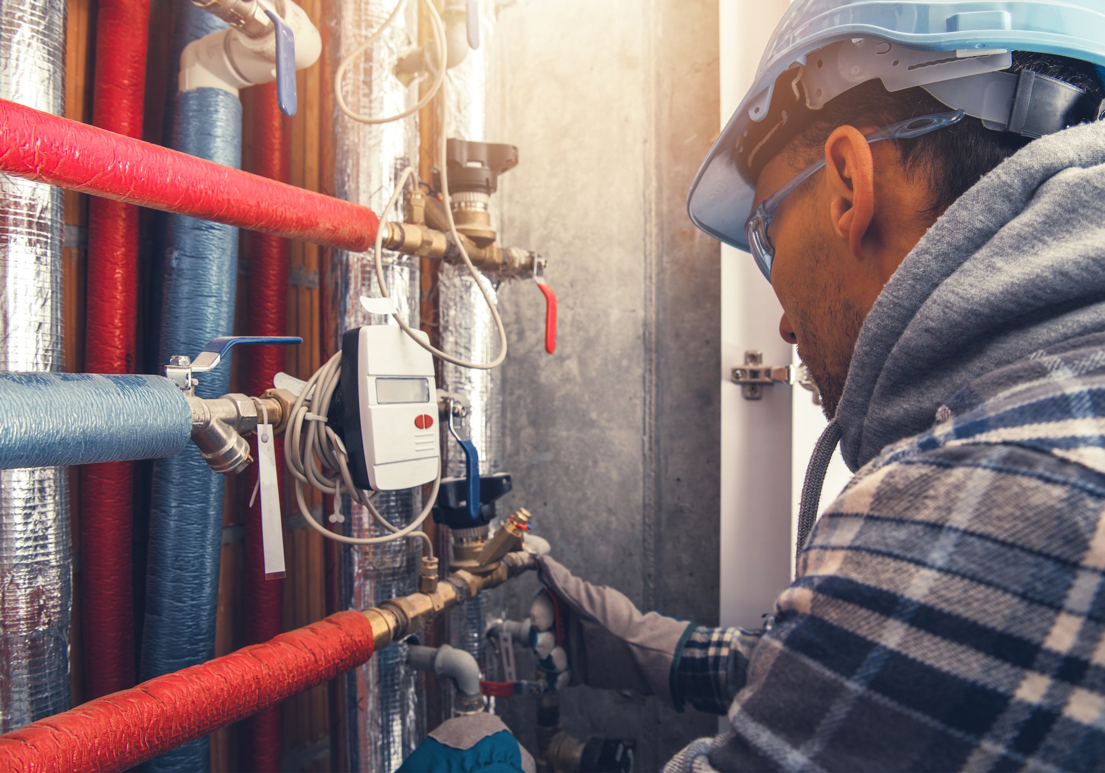 Heating Technician Making Final Check of the System